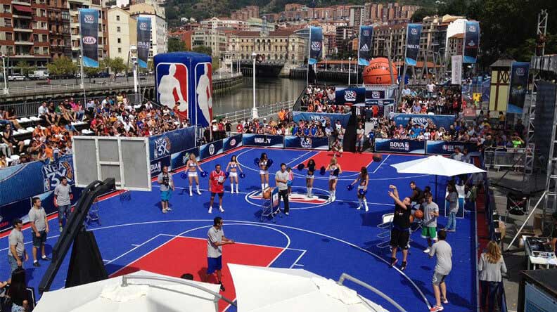 An NBA 3x3 event played on a DuraCourt basketball court.